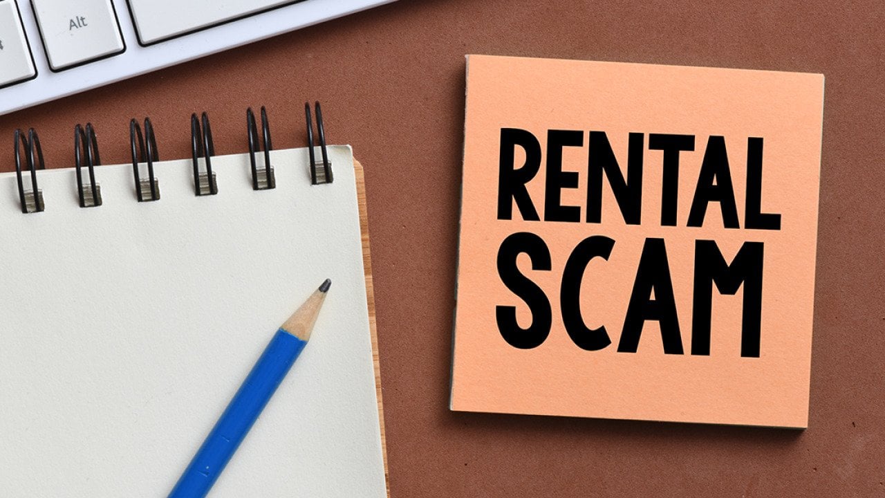 A rental scam text on a note.