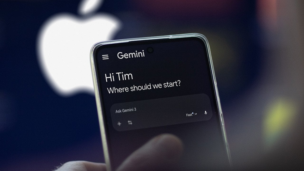 The Gemini app on a phone, with a blurred logo of Apple in the background.