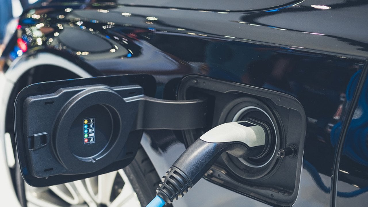 Close up on the charging socket of an EV.