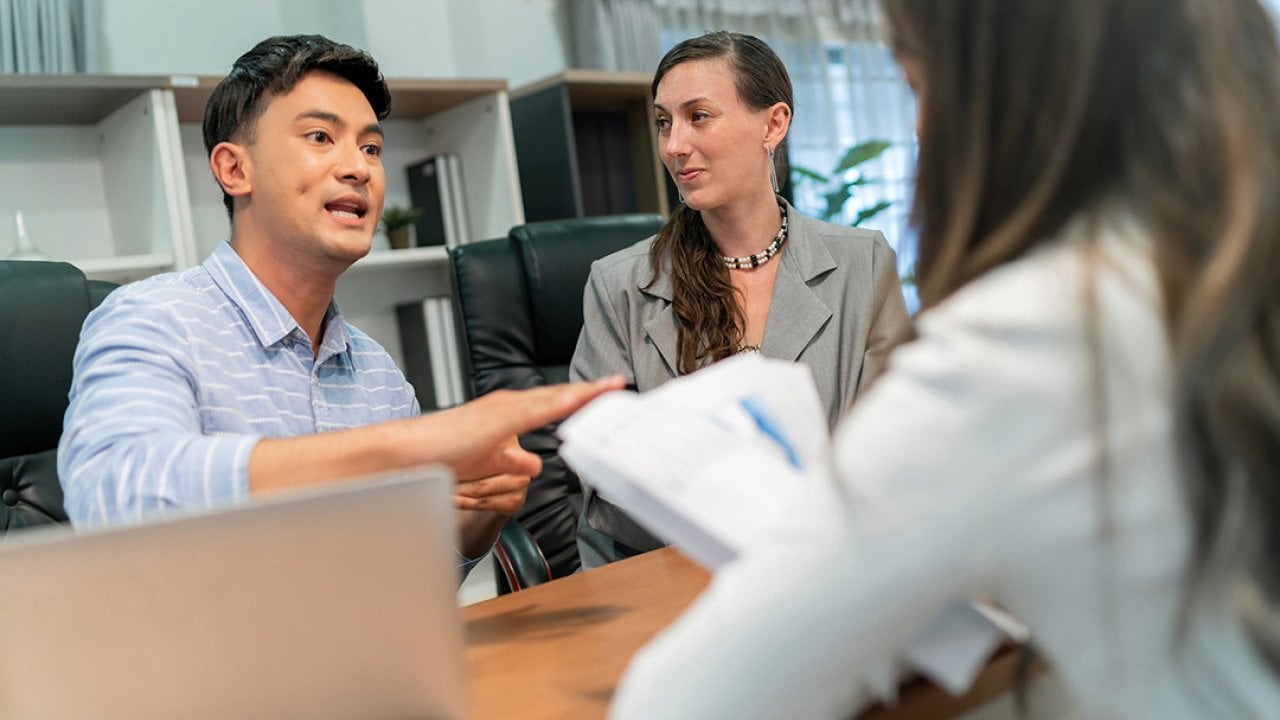A client in disagreement with a business agent.