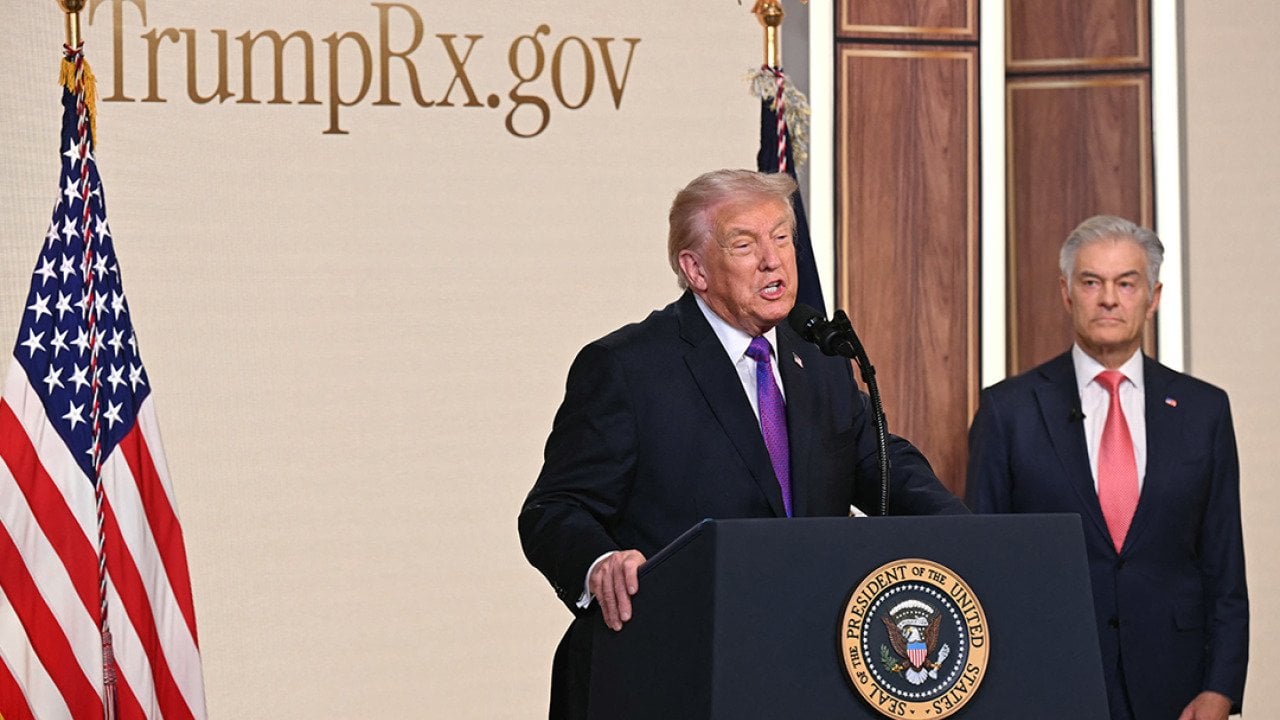 US President Donald Trump speaks about TrumpRx website as the Administrator for the Centers for Medicare & Medicaid Services Mehmet Oz listens, in the South Court Auditorium of the White House in Washington, DC, on February 5, 2026.