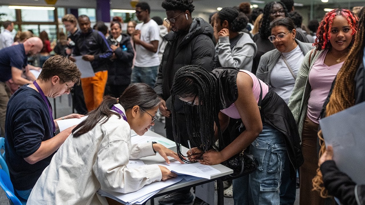 Students queue to get their GCSE results at City Of London Magistrates Court on August 21, 2025 in London, England.