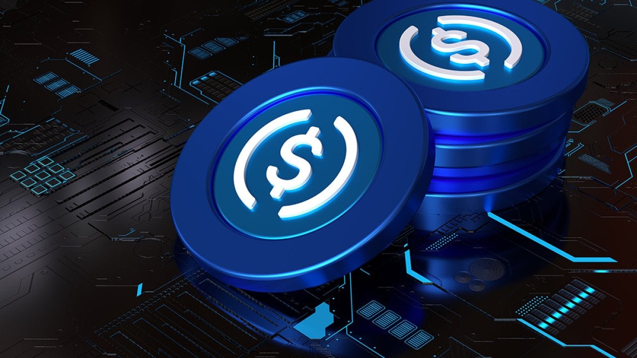 A 3D rendering of a stack of stablecoins on top of a computer circuit system.