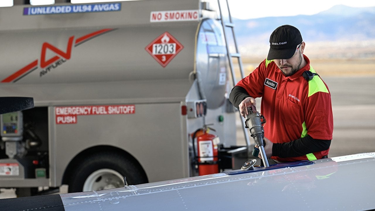 A line service technician refuels a plane using a Federal Aviation Administration approved unleaded aviation fuel at Sheltair at Rocky Mountain Metropolitan Airport.