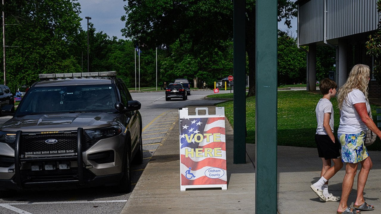 People heading to a polling place South Oldham Middle School in Crestwood, Kentucky, USA.