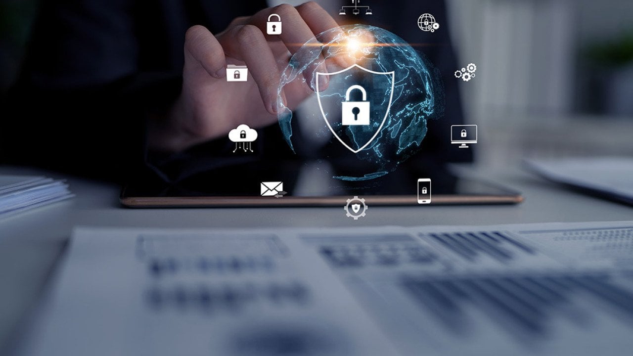 A cyber security analyst protecting digital content against breaches, hacks, and network attacks using defense strategies and tools. 