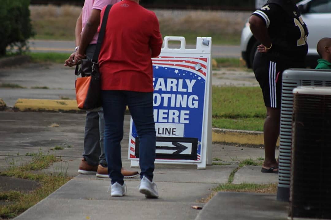 East Baton Rouge Parish, Louisiana, voters stand in line at an early voting location in 2022.