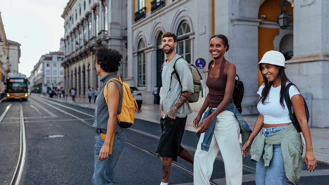 A group of friends checking out the streets of a city.