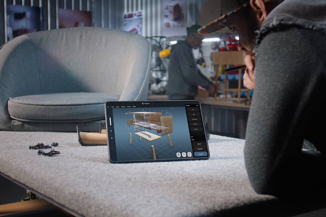 A designer creating a 3D model of a wooden bedside table through a AI software for furniture design.