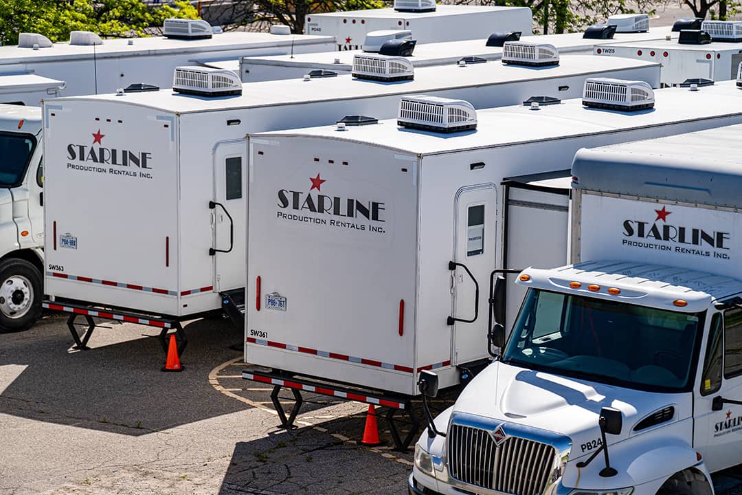 A view of Starline Production rental trucks and trailers.