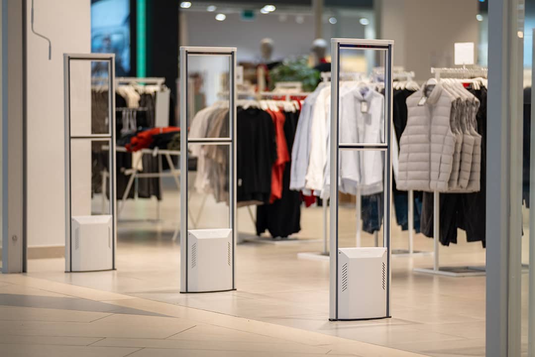 Detectors lined up at the entrance of a clothing store.