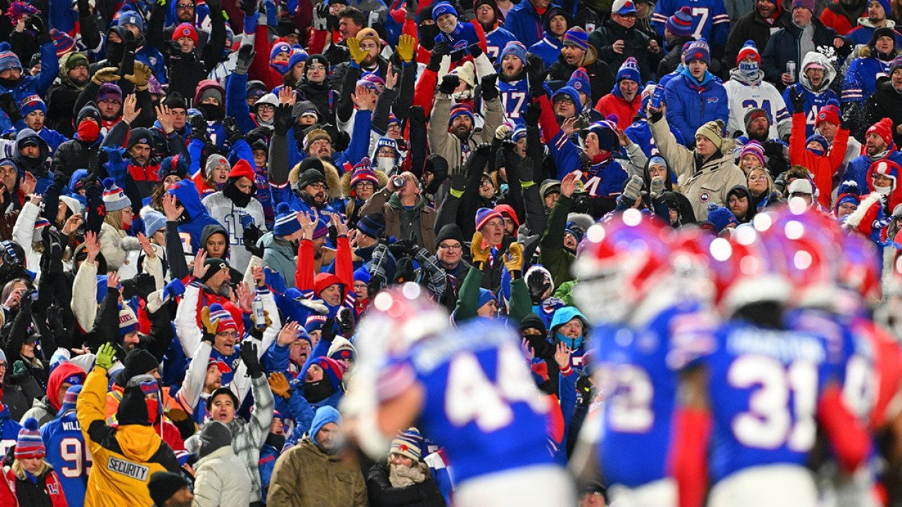 Buffalo Bills fans celebrating through an audience wave during the third quarter game against the New York Jets at Highmark Stadium in New York, USA.