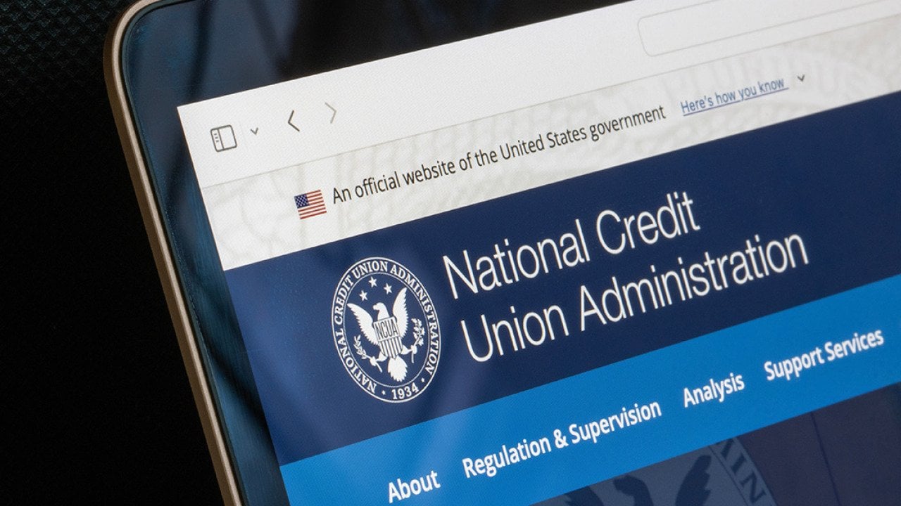 A website homepage of the United States' National Credit Union Administration displayed from a laptop screen.
