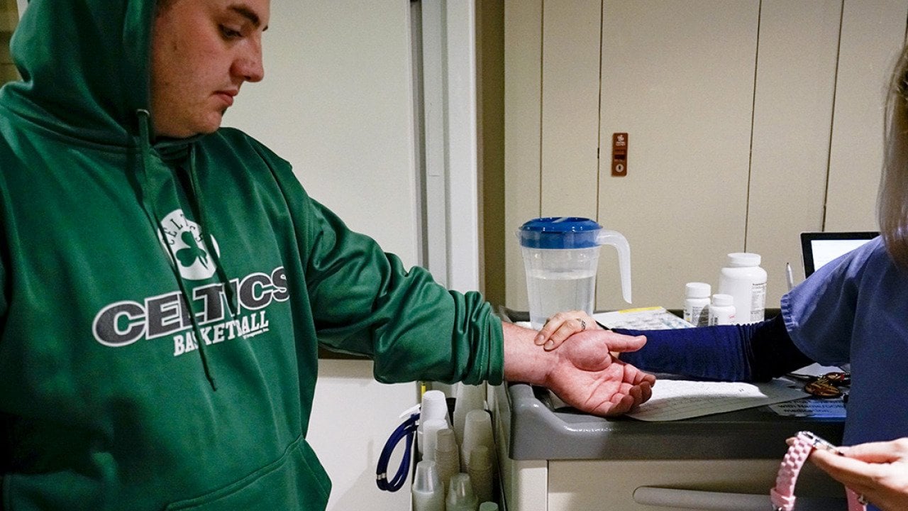 Stephen Barber being checked by a nurse before receiving a dose of suboxone at Serenity at Summit rehabilitation center in Haverhill, Massachusetts, USA.