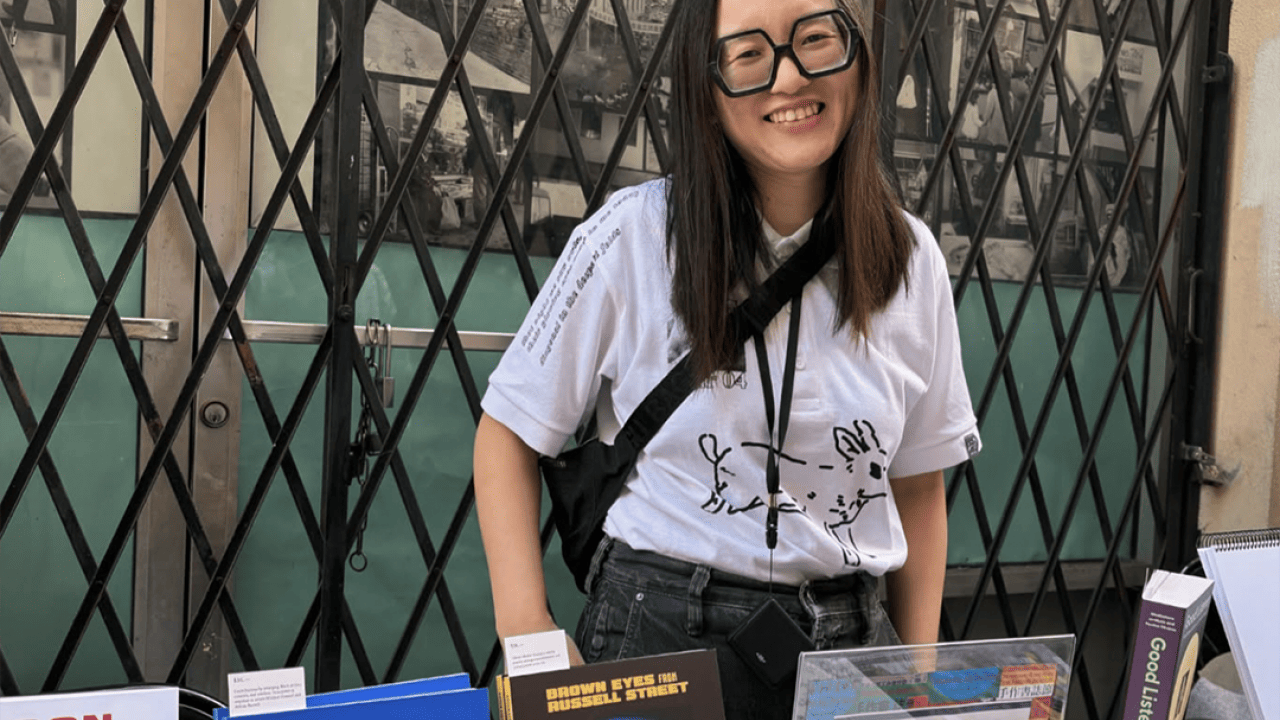 Artist-publisher Vivian Sming posing for a photo in the Sming Sming Books booth.