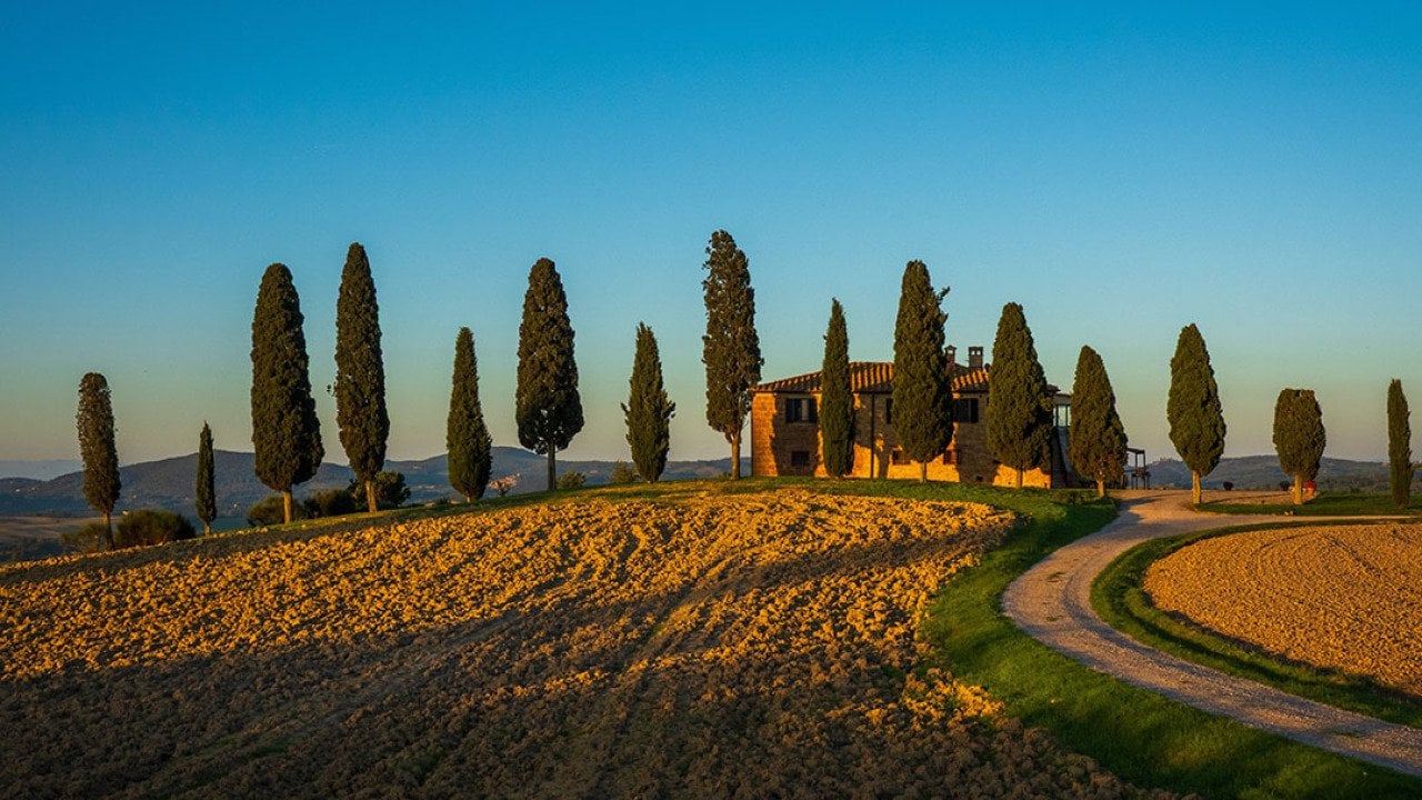 Sunset view of a rustic Italian villa