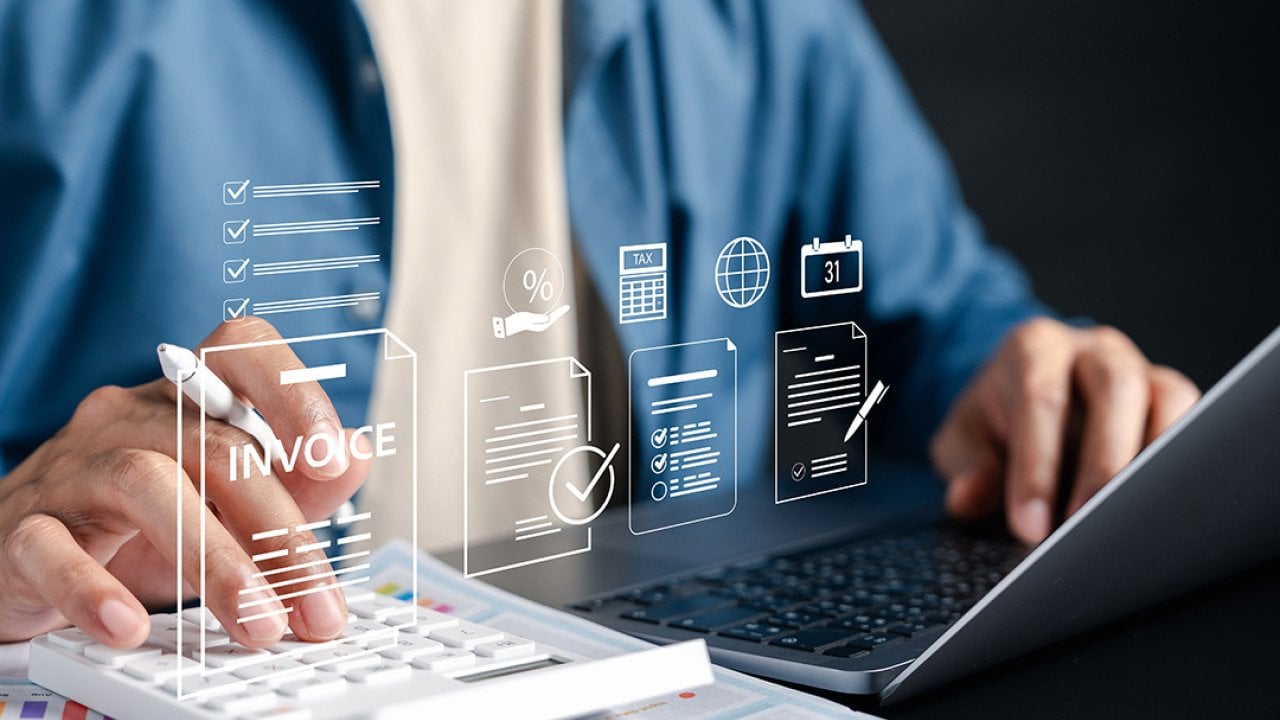 Accountant illustrated with invoice system graphics.