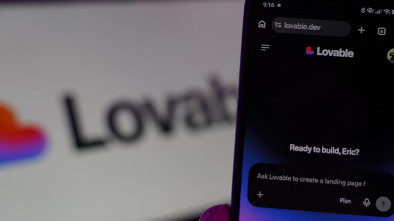 The Lovable AI app with a background of their logo.
