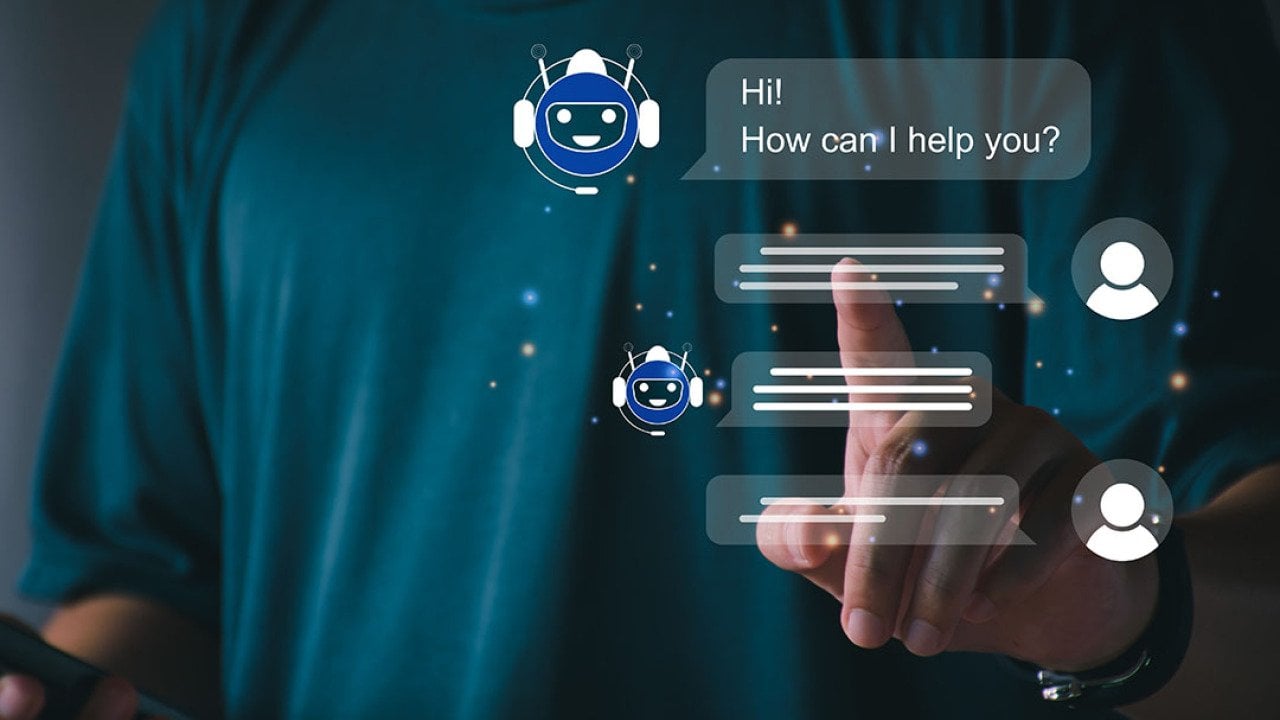 A person utilizing an AI chatbot that responds to online messages or inquiries.