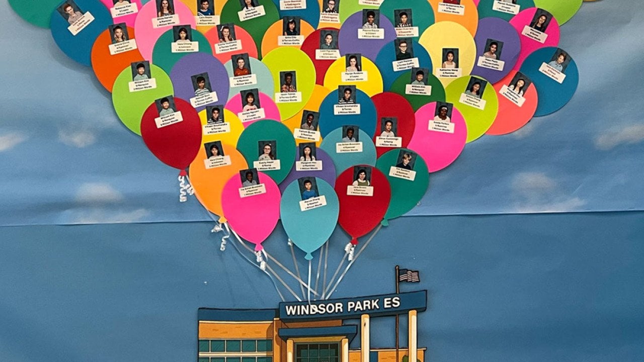 Windsor Park Elementary students are pictured on the school’s Millionaires Club display, which recognizes children who read at least one million words during the school year.