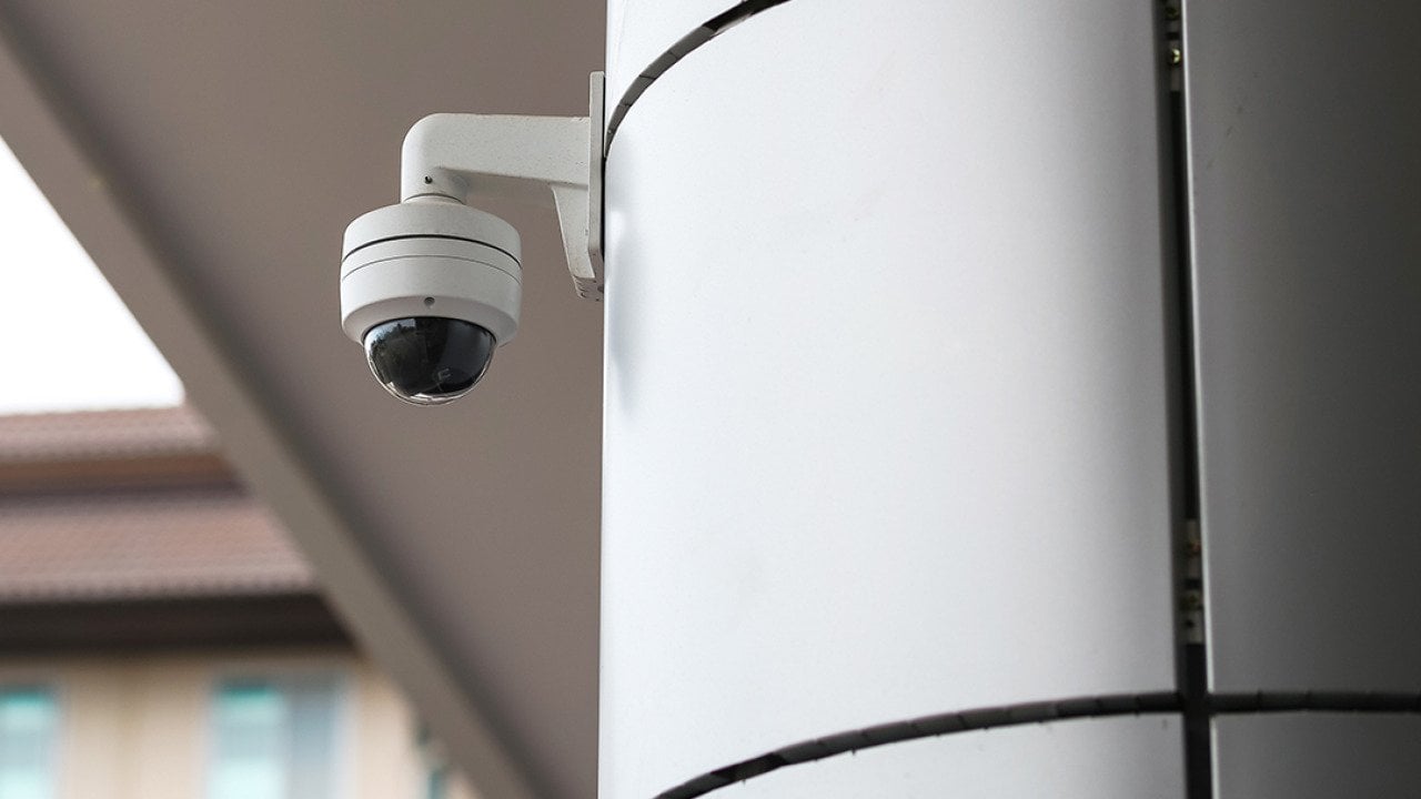 An outdoor CCTV within a school building.