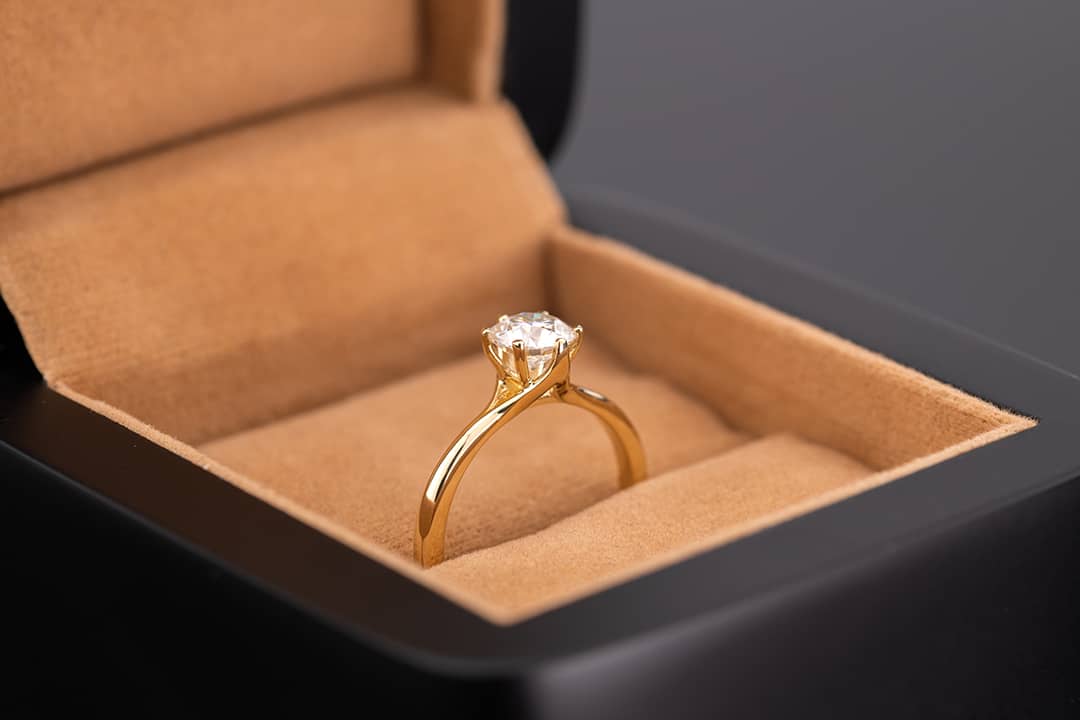 A diamond ring in a box.
