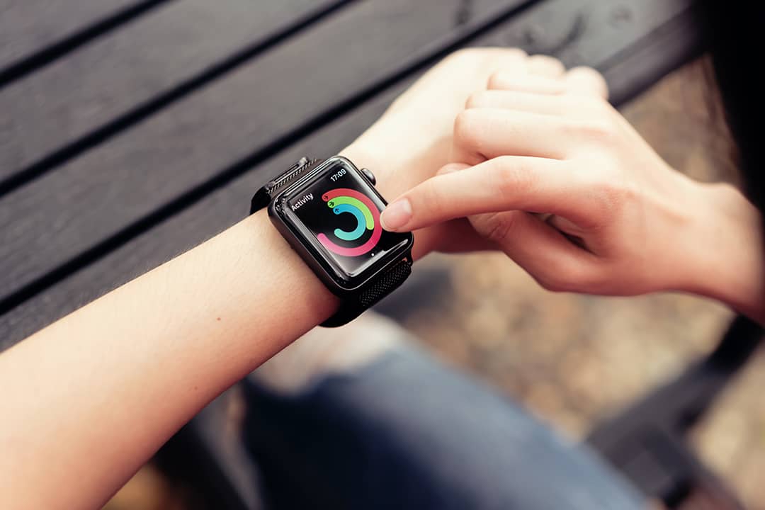 Person tracking fitness activity on a smart watch.