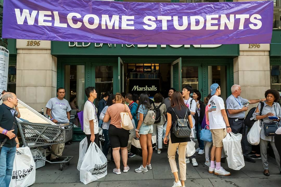 Students welcomed with a huge banner as they go back to school.