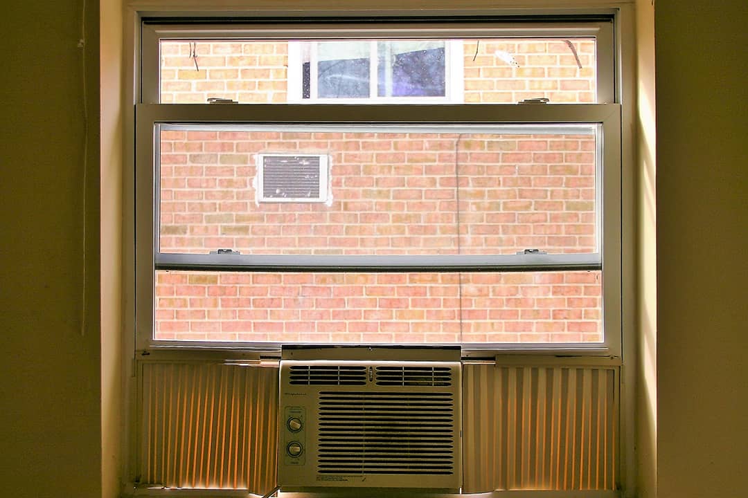 An air conditioning installed through a window.