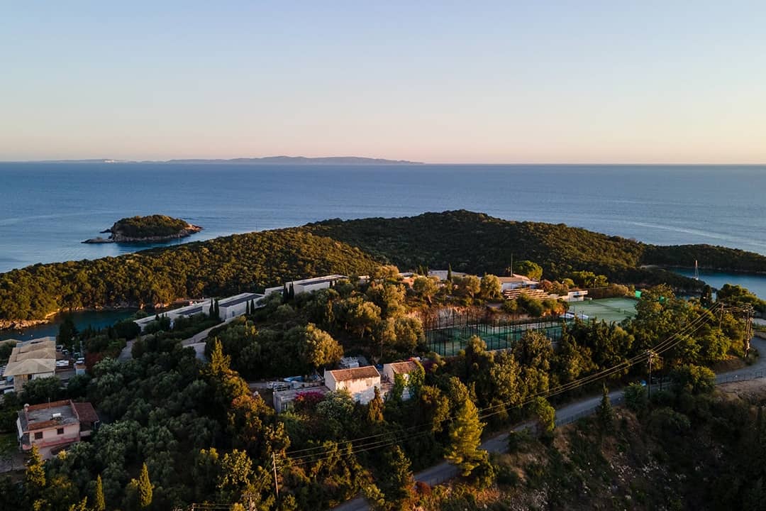 An aerial view of high-end residential houses in an island town of Syvota, Greece.