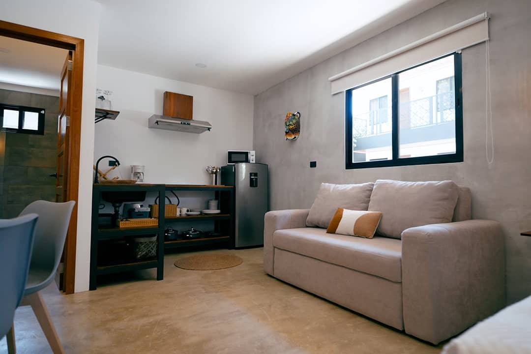 A contemporary modern studio apartment with a minimalist design.