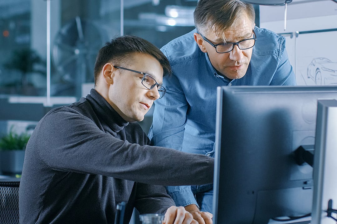 A team of senior engineers working on project.