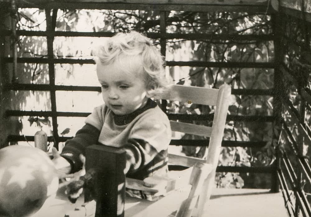 Vintage photo of little girl on balcony (sixties)