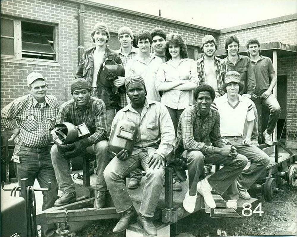Black and white photo of a high school welding class in 1984.