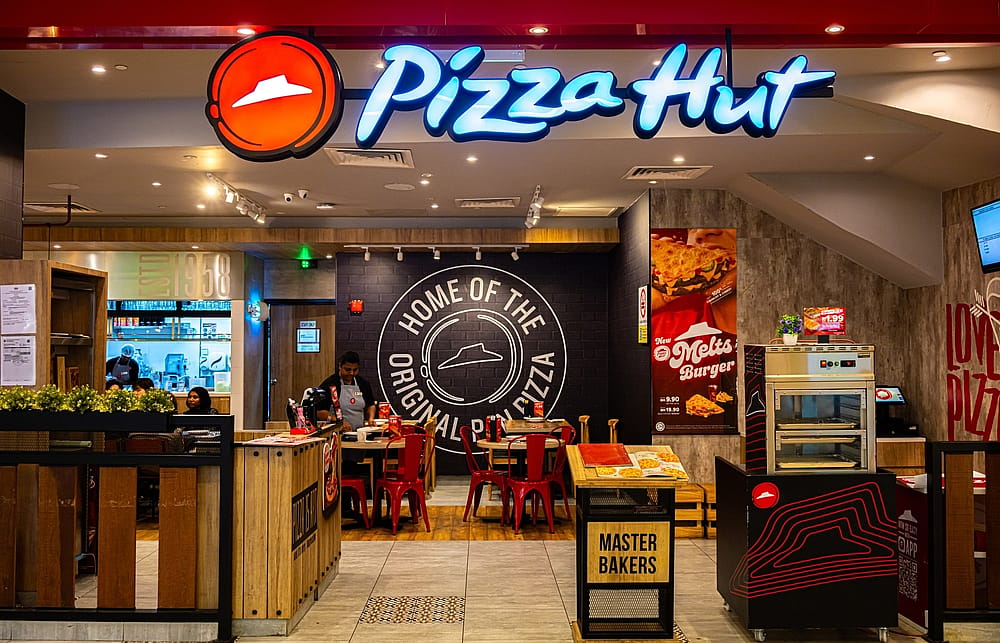  Front entrance to Pizza Hut restaurant in Malaysia shopping mall.