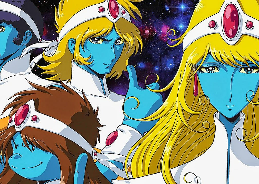 An animation of blue beings in white suits with jewels on their heads.