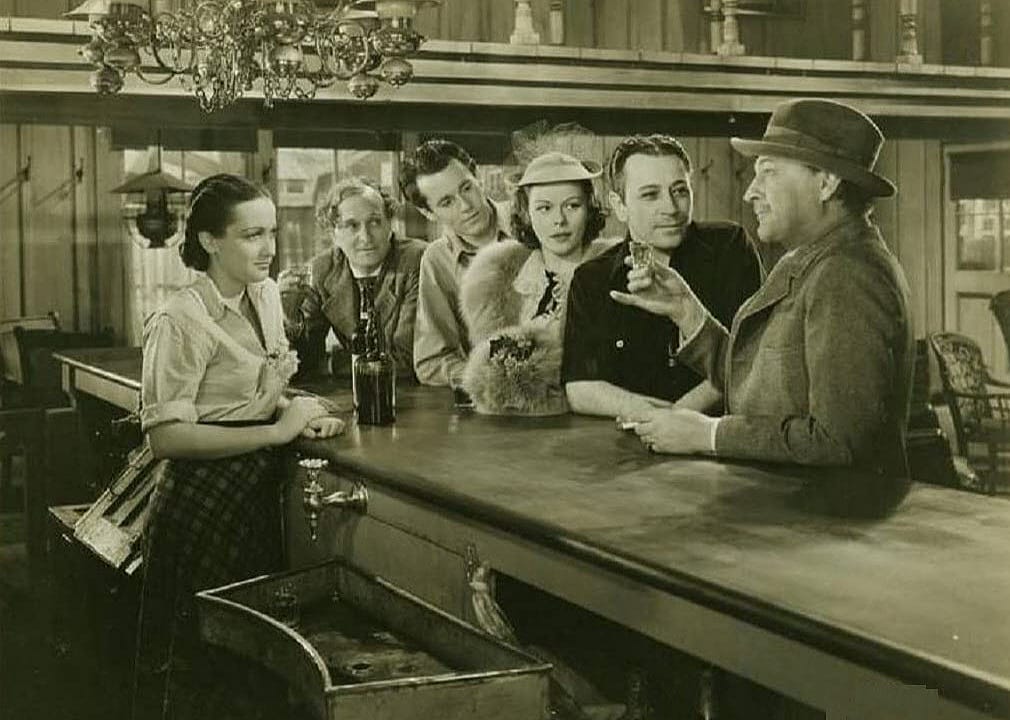 Henry Fonda, John Barrymore, Dorothy Lamour, Lynne Overman, Louise Platt, and George Raft in a scene from "Spawn of the North"
