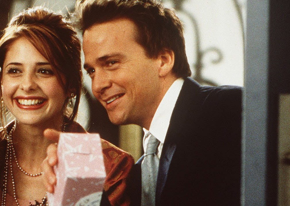 Sarah Michelle Gellar and Sean Patrick Flanery smiling together.