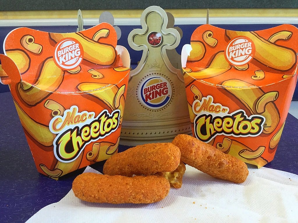 Burger King Mac n’ Cheetos with Cheetos branding and the Chester Cheetah character.