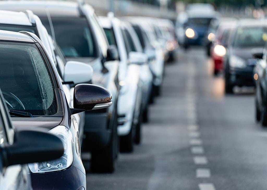 Cars during heavy traffic on the road.
