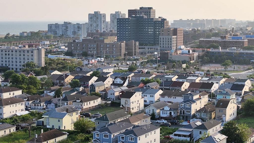 View of Edgemere Commons which is among several new affordable housing towers being built in the flood-prone neighborhood, Sea level rise predictions show its location to be partially submerged in water by the year 2100. 