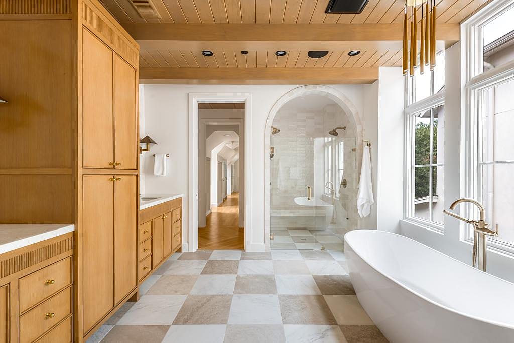 Interior of a modern bathroom with checkerboard tiles.