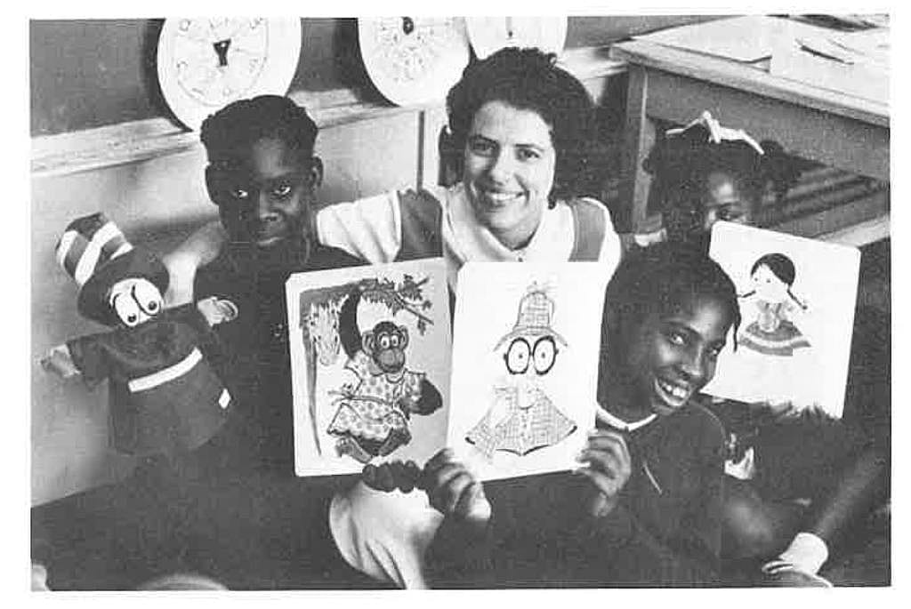Linda Stevens using puppets to teach literacy skills.