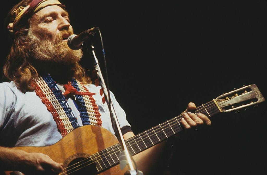 American singer, songwriter and musician, Willie Nelson performs live on stage in New York in April 1978. 