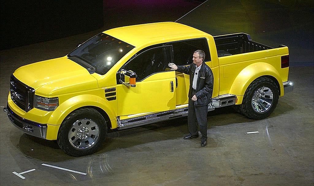 J. Mays, Vice President of Design at Ford Motor Co., shows off a Ford Mighty F-350 Tonka concept truck at the North American International Auto Show at Cobo Hall in Detroit on January 06, 2002.