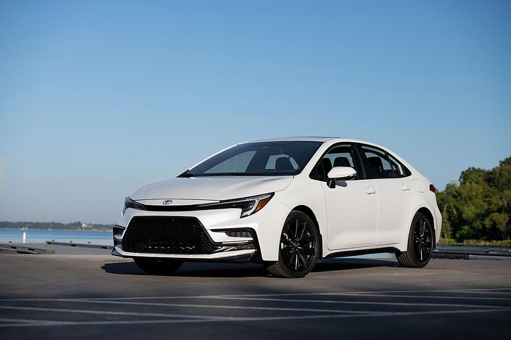 A white 2026 Toyota Corolla car on display.