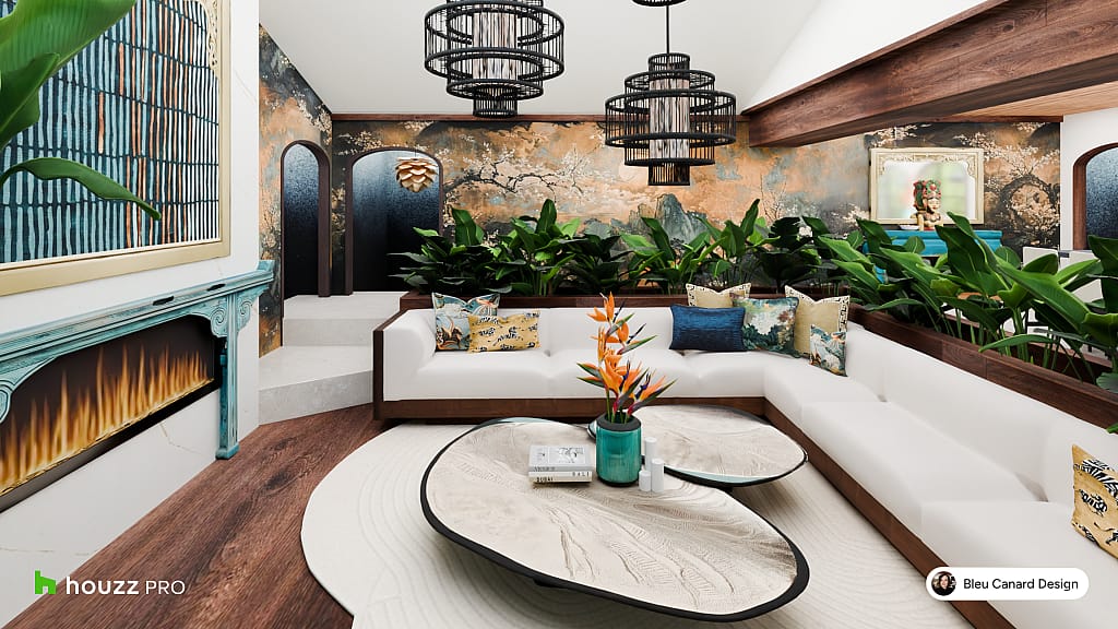 A Bali-inspired modern living room with lush tropical plants by Bleu Canard Design.