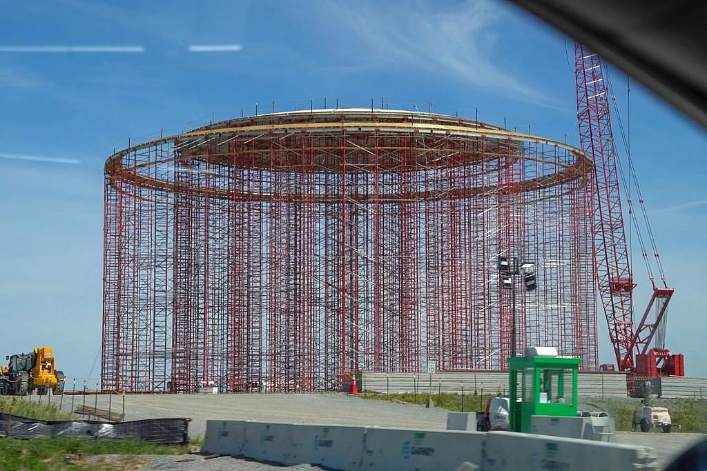 Construction on the Meta data center, mostly consisting of red metallic-looking framework in a cylindrical building shape in Holly Ridge, La., on April 6, 2026.