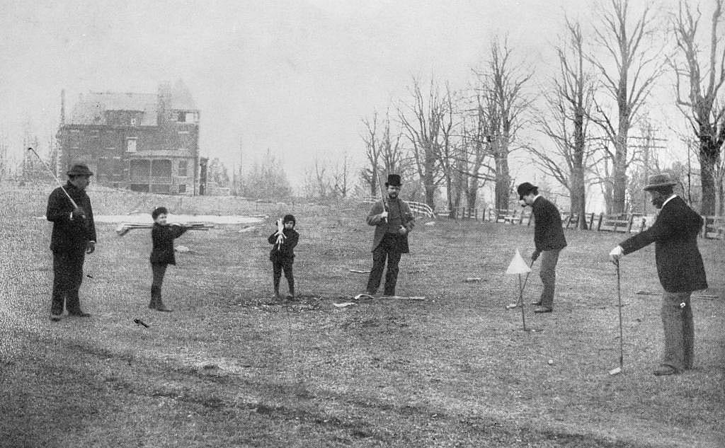 Harry Holbrook, A. Kinnan, John B. Upham, and John Reid playing golf at St. Andrews Golf Club in Yonkers, New York, USA.