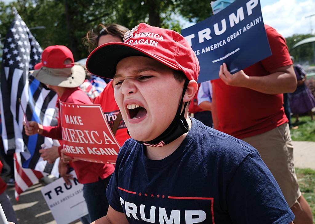 A young supporter of Donald Trump at a rally in New Jersey town during the 2020 election campaign.